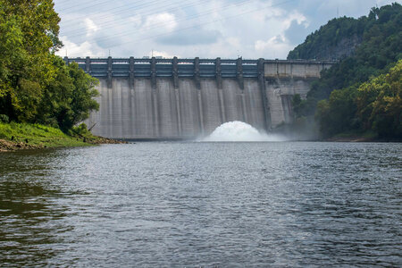 Wolf Creek Dam with sluice gates open, oxygenating water-1