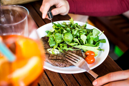 Barbequed beef steak with greens