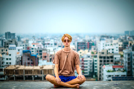 Person sitting in front of the Dhaka, Bangladesh photo