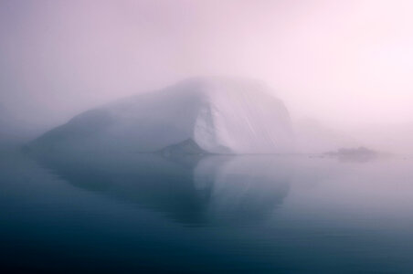 Misty Iceberg on the Sea in Greenland photo