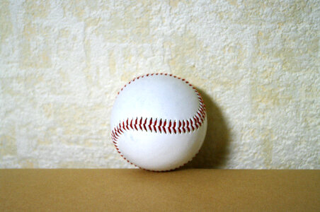 4 A ball used in playing baseball