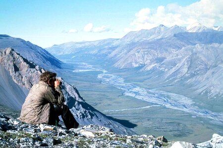 Hiker hill overlooking photo