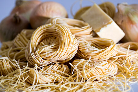 Coils of pasta and noodles photo