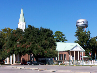 St. Peters Catholic church with Water Tower in Carencro, Louisiana photo