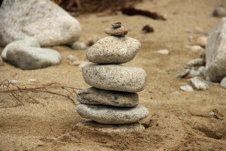 Pebbles sand stone tower photo