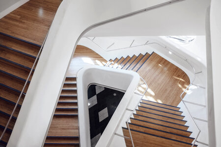 White and Wooden Stairs in Modern Interior photo