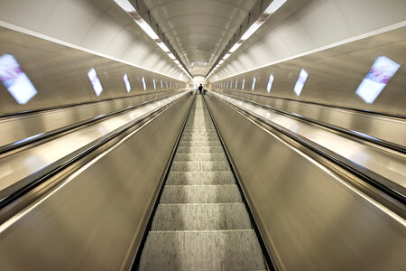 Luxury tunnel with the escalator to the metro station photo