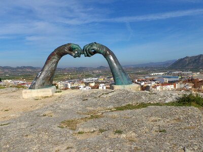 Sculpture monument arms