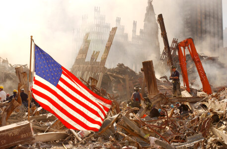 World trade Center Ruins with American Flag photo