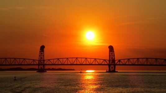 Evening sky water bridge photo