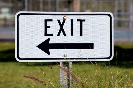 Exit sign with arrow photo