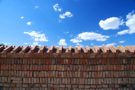 Brick wall cloud blue sky