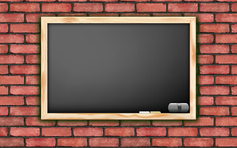 blackboard on wall Brick mortar background photo