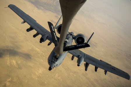 An A-10 Thunderbolt II receives fuel from a KC-135 Stratotanker photo
