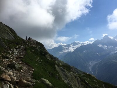 Mountain trail looking towards Mont Blanc mountain range photo