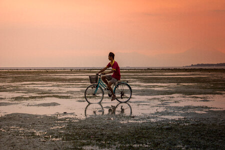 Man on Bicycle in Indonesia photo