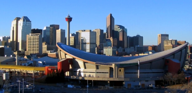 The Saddledome and the Skyline with towers in Calgary, Alberta, Canada photo