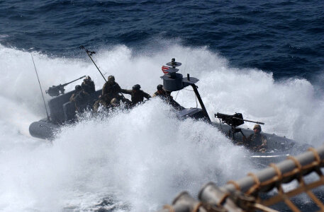 A Special navyBoat Team approaches photo