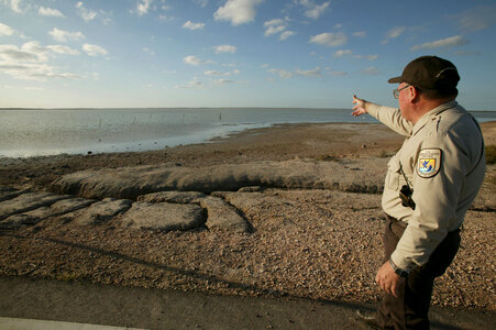 U.S. Fish and Wildlife Service employee surveys restoration