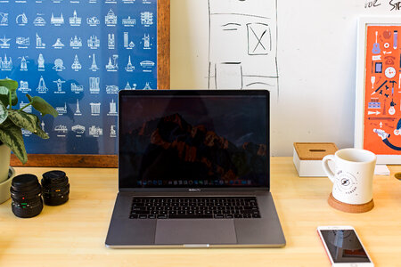 Freelance Home Office Workspace with MacBook photo