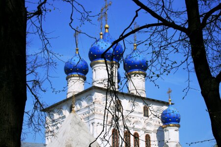 6 white towers bright blue domes building