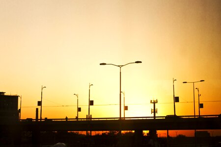 Sunset silhouette bridge photo