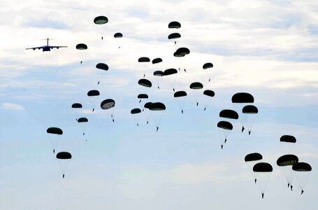 Clouds parachuting airborne photo