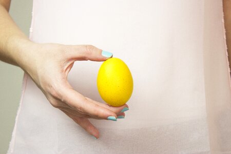 Woman Holding Easter Egg photo