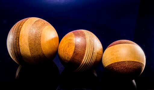 Wooden ball turned hand labor photo