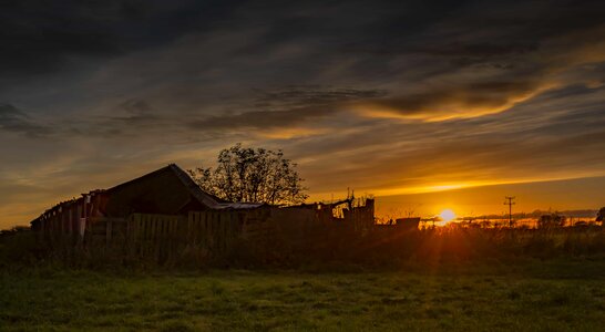 Backlight barn cloud photo