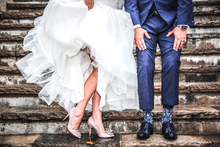 Legs of Bride and Groom on Stairs photo
