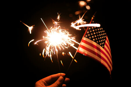 Fireworks and American Flag on 4th of July photo