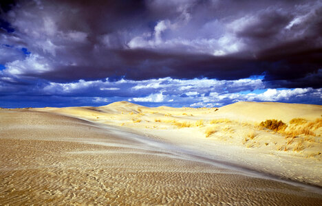 Heavy Clouds moving over the Sand Dunes photo