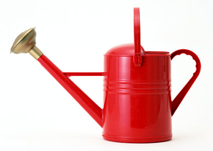 Red watering can photo