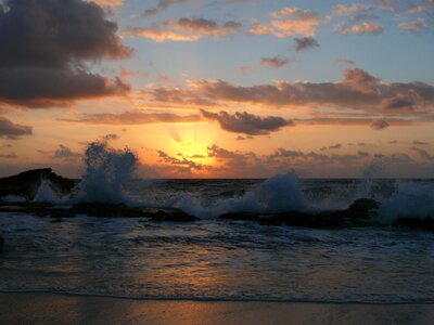 Sunset ocean waves photo