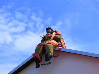 Fire fighter roof figure fire photo