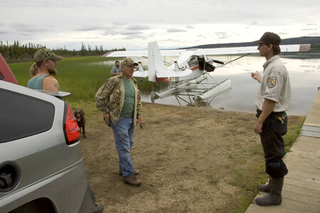 U.S. Fish and Wildlife Service employee talking to some adults at Tetlin National Wildlife Refuge photo