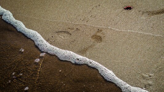 Beach sand water photo