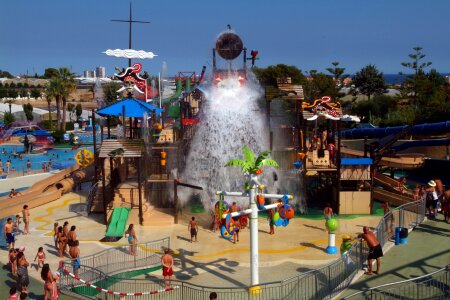 Water pouring out of a huge bucket photo