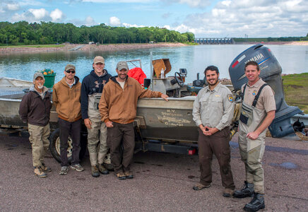 Fishery workers at Gavins Point National Fish Hatchery