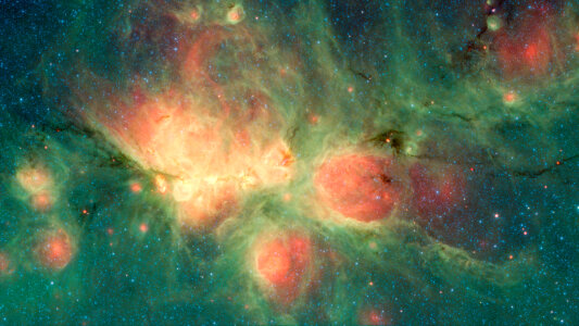 Newborn Stars Blow Bubbles in the Cat's Paw Nebula photo
