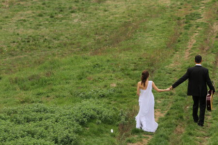 Bride downhill groom photo