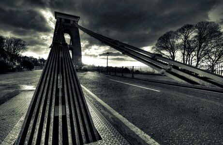 Night road suspension bridge