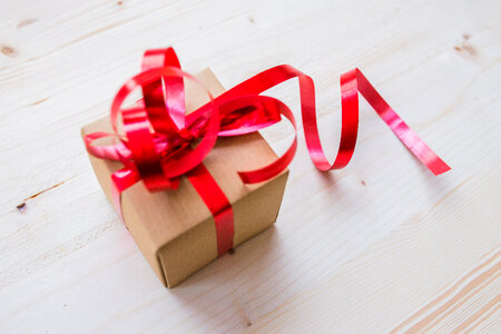 Present Box with Ribbons tied around it photo