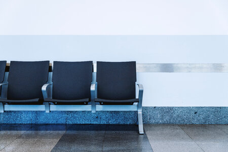 Modern waiting area in the airport. Empty seat photo