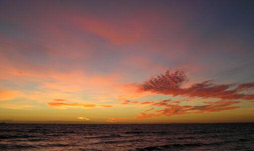 Water orange clouds photo