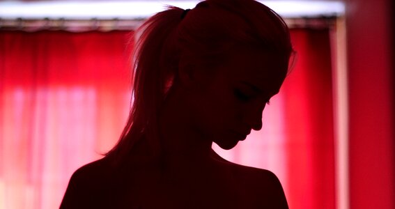 Girl silhouette red light