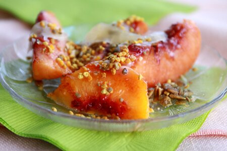 Pumpkin seeds melted cheese peaches photo