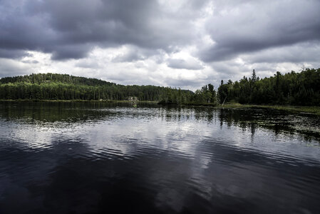 Shoreline, lake, and clouds in Algonquin Provincial Park, Ontario photo