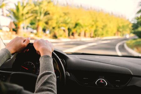 2 Young woman driving a car photo